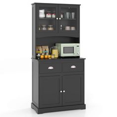 a kitchen cabinet with a microwave on top