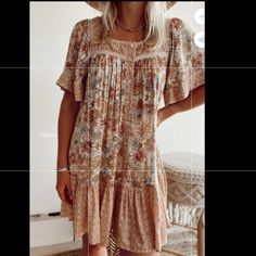 Our California Dreamin' Dress Features A Square Neckline, Mixed Floral Print, Flowy Relaxed Silhouette, And Short Sleeves. Multi 100% Cotton Recommended Sizing: S 0-4, M 6-8. L 10-12 Casual Boho Dress With Print For Garden Party, Casual Boho Dress For Garden Party, Casual Knee-length Boho Print Dress, Flowy Knee-length Boho Dress, Casual Boho Dress With Knee-length Boho Print, Flowy Boho Print Knee-length Dress, Beige Boho Mini Dress For Vacation, Flowy Knee-length Boho Print Dress, Beige Mini Boho Dress For Vacation