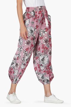 Look stylish and feel comfortable in these Marsala Floral Pants. The elastic cuff bottom and elastic waist with tassels give you a perfect fit while the relaxed fit and pockets provide you with comfortable movement. The beautiful floral print adds a touch of elegance, making these pants perfect for any occasion. With a pair of these Marsala Floral Pants, you'll be sure to look and feel great all day long. Style with the matching kimono and our handbeaded jewels for an elevated look. Floral print Leopard Bag, Floral Print Pants, Floral Pants, Long Style, Look Stylish, Bag Dress, Printed Pants, Hand Beading, Floral Printed