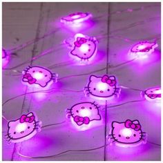 purple hello kitty lights are on the ground