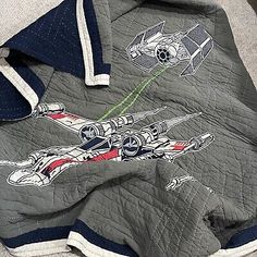 a quilted jacket with star wars characters on it