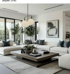 a living room filled with white couches and lots of windows next to each other