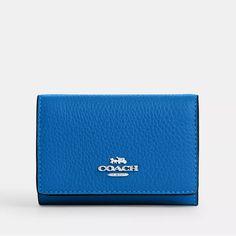 Coach Micro Wallet Silver/Bright Blue Measurements Length: 4.0" Height: 3.0" Width: 1.25" Refined Pebble Leather Zip Coin Pocket Snap Closure Full-Length Bill Compartment Three Credit Card Slots Style No Cm238 Bags Coach, Bright Blue, Pebbled Leather, Coach Bags, Snap Closure, Card Slots, Slots, Credit Card, Full Length