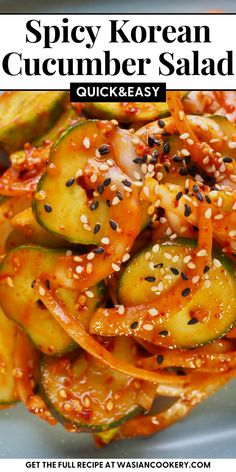 spicy korean cucumber salad on a plate with sesame seeds and black sesame seeds