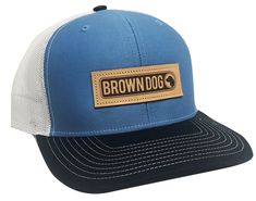 Classic trucker cap style built with the Richardson quality and fit you’ve come to expect with the traditional Brown Dog leather patch. ​​​SHAPE: MidProFABRIC: Cotton-Poly/Nylon MeshVISOR: PrecurvedSWEATBAND: CottonFIT & SIZE: Adjustable Snapback, One Size Fits Most Outdoor Six-panel Trucker Hat With Leather Patch, Casual Six-panel Trucker Hat With Leather Patch, Adjustable Leather Trucker Hat With Letter Patch, Brown Trucker Hat With Leather Patch And Curved Bill, Brown Trucker Hat With Leather Patch, Outdoor Brown Baseball Cap With Letter Patch, Trucker Hat With Leather Patch And Curved Brim, Trucker Hat With Leather Patch, Six-panel, Leather Trucker Hat With Logo Patch And Curved Bill