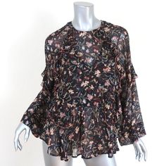 Gently worn. Great condition. No flaws. Retails for $345! Bohemian Black Tops With Ruffles, Feminine Black Ruffled Blouse, Feminine Ruffled Tops, Elegant Ruffle Sleeve Floral Print Blouse, Elegant Ruffle Sleeve Blouse With Floral Print, Elegant Blouse With Floral Print And Ruffle Sleeves, Fall Daywear Blouse With Ruffle Sleeves, Black Blouse With Ruffle Hem And Ruffled Collar, Black Blouse With Ruffle Hem For Fall