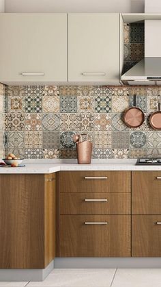 a kitchen with wooden cabinets and tile backsplash