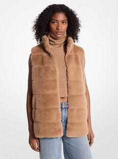 Transitional weather calls for chic layering styles that provide just the right amount of warmth. Our version is a vest crafted from quilted faux fur with a relaxed fit and finished with handy pockets. Style it best with a turtleneck in a warm neutral hue. Faux Fur Gilet, Brown Faux Fur Vest, Fur Gilet, Layered Fashion, Faux Fur Vest, Faux Fur Vests, Fur Vest, T Shirt Vest, Fashion Ideas