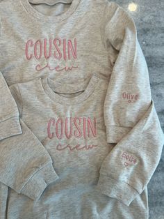 three children's sweatshirts with the words cusin and cousin on them