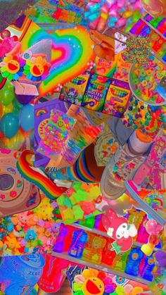 a large amount of candy and candies are piled on top of each other in this image