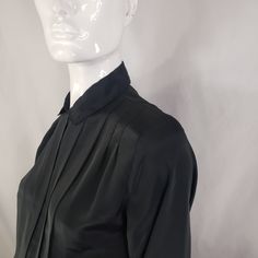 "by Kristin, black blouse with hidden buttons panel and front pleats. Fits Medium 19\" across 23\" long 23\" sleeves * Please review all shop policies before completing transaction. All sales final. No returns or exchanges. * Bundle up for combined shipping. * Instagram @vintagerunsdeepshop" Fitted Pleated Tops For Work, Elegant Pleated Evening Blouse, Elegant Pleated Blouse For Evening, Chic Black Pleated Top, Spring Formal Pleated Blouse, Fitted Tops With Pleated Sleeves For Formal Occasions, Formal Blouse With Pleated Sleeves, Fitted Pintuck Tops For Workwear, Long Sleeve Pleated Shirt For Work