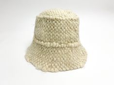 Trendy white wool bucket hat will protect your head from cold winter . The texture hat is very warm, soft and comfortable to wear. This Panama is the best fashion decision for fall-winter season in 2021-2022. SIZE: S-M (56-57) in stock M-L (58-59)Custom Made L-XL (60-61)Custom Made Custom Made design is made after a base pattern, similar to ready-to-wear. Note that it will take our team 10 - 15 days to make your product, so remember to add this to the delivery time. Made of 100% wool. Linen(Lini White Brimmed Bucket Hat For Winter, White Winter Bucket Hat With Short Brim, White Short Brim Bucket Hat For Winter, White Casual Cloche Hat For Winter, White Curved Brim Bucket Hat For Winter, White Wool Hat With Short Brim, White Brimmed Warm Hat, White Warm Brimmed Hat, Cream Cloche Hat With Short Brim For Winter