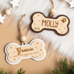 personalized dog bone ornament with name and star design on the front in wood