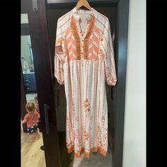 Super Cute, Flowy, Fun Boho Dress, Cute With Flip Flops Or Cowgirl Boots. A Little On The Generous Side Of Small! “40 Length From Waist To Hem! White Boho Print Dress For Fall, Orange Tunic Maxi Dress For Spring, Bohemian Orange Maxi Dress For Day Out, White Boho Print Maxi Dress For Day Out, Orange Maxi Boho Dress For Spring, Spring Orange Boho Print Maxi Dress, Bohemian White Printed Midi Dress, White Boho Print Midi Dress For Vacation, White Boho Print Maxi Dress For Brunch