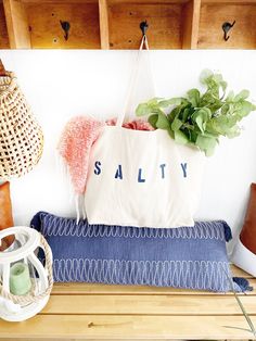 "The SALTY Oversized canvas tote bag is perfect for a trip to the beach! Also perfect to use as a reusable shopping bag, or everyday carryall. Available with text in several colors... check out the variations! This bag is made from 100% thick, sturdy canvas. AVAILABLE IN TWO SIZES * Large - 19.5\" x 13\" with a 4\" gusset *Jumbo - 23\" x 13\" with a 6\" gusset These bags are hand painted using non-toxic fabric paint. The technique used creates an attractive distressed appearance to the text that Girls Beach Trip, Canvas Beach Tote, Perfect Beach Bag, Large Beach Bags, Gift Totes, Sac Week End, Summer Fashion Beach, Bag Summer, Over Sized