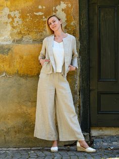 "MADE TO ORDER - Basic long, flared linen pants, fluid and breezy, ideal for hot summer days. Featuring a minimalist design, they can be easily matched with any top of your choice: boxy, cropped, fitted or even tunics. Finished in a topstitched elastic waistband to fit and flatten all body shapes. Shown here in Oatmeal 200 gsm medium weight linen. SIZING To choose the right size, check out our body measurements chart displayed in the product listing photos. If you need specific sizing recommenda Beige Linen Wide Leg Pants For Fall, Chic Linen Culottes For Spring, Spring Linen Pants In Flax Color, Beige Straight Culottes For Spring, Linen Wide Leg Pants For Fall, Spring Linen Wide Leg Pants, Chic Linen Pants For Spring, Fall Linen Wide Leg Pants, Elegant Flax Pants For Spring