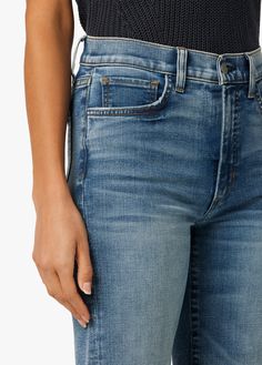 The Molly High-Rise Flare is fitted at the waist and kicked out at the hems, creating a curve-hugging ’70s-inspired silhouette. This flattering five-pocket jean features stretch denim in a medium-light wash 'Everyday'. The wide hems and subtle destruction make for attitude in the fit and wash.10 1/4" RISE34" INSEAM81% Cotton, 18% Polyester, 1% ElastaneMODEL IS WEARING SIZE 26
10 1/4" front rise 
14 1/4" back rise 
22 3/4" leg opening
34" inseam Size Chart For Kids, Online Clothing Store, Savile Row, 70s Inspired, Jeans Online, Newborn Boy, Denim Design, Womens Size Chart, Newborn Girl