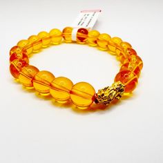 Lucky 18k Gold Citrine Pixiu Bracelet (Piyao) (18k Pixiu) The Pixiu Is A Symbol For Wealth, Good Fortune, And Protection. It Is Believed To Be Loyal To Its Owner, And Protects Them From Harm And Wards Off Evil Spirits. Citrine Citrine Is A Golden-Yellow Gemstone That Is Associated With Abundance, Manifestation, And Personal Power. It Is Believed To Attract Wealth And Success, Enhance Creativity And Imagination, And Promote Self-Confidence And Motivation. Citrine Is Also Thought To Aid In The Tre Symbol For Wealth, Pixiu Bracelet, Screw Bracelet, Be Loyal, Abundance Manifestation, Nail Bracelet, Stretchy Beaded Bracelet, Twisted Bangle, Disc Bracelet