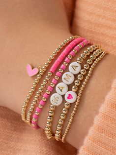 The perfect valentines gift for your loved one! A bracelet that will put a smile on anyone’s face. How cute is this heart charm added on to our best-selling stretch bracelet? Designed with durability in mind, our gold-fill beads and charms are secured on extra-strength stretch cord to withstand your busy life and maintain their shine. Whether you dress them up, dress them down, or pile them on, you’ll truly never take them off. Matching Heart Bracelet, Preppy Jewlery, Preppy Beads, Valentine Bracelets, Everyday Stretches, Pyrite Bracelet, Letter Bracelet, Letter Beads, Initial Jewelry