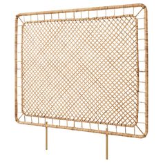 a woven bamboo frame with wooden posts