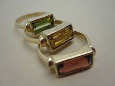 Rectangular Peridot Stack Ring in 14K Yellow Gold by Studio1040, $475.00 Rectangular Yellow Gold Ring With Gemstone, Modern Rectangular Rings With Accent Stones, Formal Rectangular Birthstone Ring, Fine Jewelry Rectangular Faceted Ring, Rectangular Faceted Fine Jewelry Ring, Fine Jewelry Faceted Rectangular Ring, Green Rectangular Rings With Bezel Setting, Green Rectangular Bezel Set Ring, Fine Jewelry Rectangular Yellow Gold Birthstone Ring