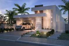 a white car is parked in front of a house with palm trees on the side