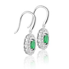 Introducing Zomier Earrings - Emerald, the epitome of elegance and sophistication. These exquisite emerald earrings are perfect for those seeking a touch of luxury. Crafted with utmost precision, the earrings boast a stunning emerald gemstone, renowned for its rich green color and captivating sparkle. The presence of the GTC Certificate ensures its authenticity and purity, adding further value to this masterpiece. With a sleek and timeless design, these earrings effortlessly complement any outfi Emerald Drop Earrings, Emerald Earrings Drop, Timeless Engagement Ring, Engagement Earrings, Lab Created Emerald, Jewellery For Women, Family Jewellery, Sterling Silver Drop Earrings, Double Halo