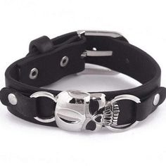 WE LOVE SKULL jewelry and this one does not disappoint. One for the men in your life. Features an adjustable closure. Sold as one individual bracelet. Adjustable Emo Style Bracelet As Gift, Adjustable Emo Style Bracelet For Gift, Adjustable Emo Style Bracelets, Adjustable Punk Cuff Bracelet With Black Band, Black Rock Style Wristband As Gift, Adjustable Black Band Punk Cuff Bracelet, Adjustable Black Punk Wristband, Adjustable Stainless Steel Edgy Bracelets, Adjustable Black Cuff Bracelet Punk Style