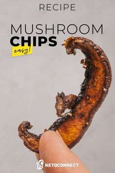 a hand holding a piece of food with the words recipe mushroom chips on it