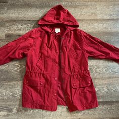 Never Worn! Heavy Duty Rain Jacket, Runs A Little Large. Red Parka With Pockets For Fall, Red Long Sleeve Outerwear With Pockets, Casual Red Outerwear For Cold Weather, Red Hooded Outerwear With Pockets, Red Hooded Outerwear For Fall, Red Long Sleeve Windbreaker For Cold Weather, Casual Red Outerwear For Outdoor, Casual Red Cotton Outerwear, Red Hooded Cotton Outerwear