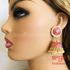 Rajasthani Meenakari Jhumka Earrings with Pearl beads Premium Quality Kundan Jhumka Earrings Length: Approx. 2.5" Light-weight Push-Back closure Gold Finish on high-quality brass as the base metal, Kundan stones and Pearls Suitable for any traditional or contemporary attire and occasion In-stock & ready-to-ship **Color may vary slightly due to photography and lighting. Meenakari Bridal Earrings For Puja, Bridal Meenakari Earrings For Puja, Temple Jewelry Meenakari Jhumkas For Festivals, Red Cutdana Earrings For Puja, Bollywood Style Meenakari Earrings For Puja, Temple Style Meenakari Jhumkas For Festivals, Festival Meenakari Temple Jhumkas, Meenakari Earrings For Navratri Puja, Navratri Meenakari Earrings For Puja