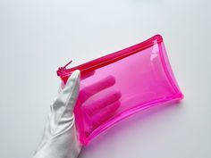 "Pink phone pouch, pencil casse, travel toiletry, hot pink, makeup bag, simple purse, easy to clean, bag organizer, jelly handbag, security Standard Shipping = Express Shipping by Fedex Vinyl cosmetic bag made of milky transparent material. Easy to keep clean, practical.  Our vinyl does not have a violet or blue color. size 18 x 15 cm // 7.09 x 5.9 inches We offer gift wrapping and beautiful personalized tickets. You can order our products for a gift and we will send them directly to the person you gave. Our bag are 100 % handmade. We are a legally operating company from Europe. Our bags are patented, 95% of our offer is vegan (free from cruelty), vinyl made of bags is biodegradable and in our work we use environmentally safe accessories, for example, RAINFOREST ALLIANCE CERTIFIED. If you Pink Rectangular Pouch For Storage, Pink Rectangular Cosmetic Bag For Storage, Pink Rectangular Cosmetic Bag, Pink Zipper Pouch For Cosmetic And Toiletry Storage, Trendy Pink Cosmetic Storage Pouch, Trendy Pink Cosmetic Bag For Storage, Trendy Pink Cosmetic Pouch, Trendy Pink Rectangular Pouch, Pink Pencil Case With Removable Pouch For Daily Use