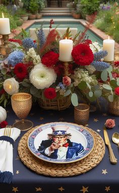 the table is set with red, white and blue flowers