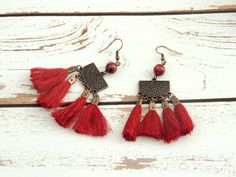 "Oid Red Vintage Ethnic Hanging earrings Beautiful Tassel, Beads & stones Earrings. Made from metal and lovely beads and Long Tassel in different colors and shapes. It is good for wedding party, any other special occasion and also for daily life. Beautiful handmade art with loops material and threading beads, all these creates an impressive and spectacular colorful earring. Excellent quality materials. Size: 2.5\"/1\". * Handmade * Lovely Design * light weight * Excellent quality * Complimen Red Dangle Tassel Earrings With Latkans, Red Bohemian Beaded Earrings With Tassels, Bohemian Red Beaded Earrings With Tassels, Adjustable Red Bohemian Tassel Earrings, Red Bohemian Tassel Earrings As Gift, Red Bohemian Tassel Earrings, Red Tassel Chandelier Drop Earrings, Traditional Fringe Earrings For Gift, Traditional Red Tassel Earrings For Festival