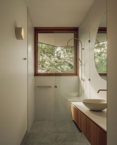 the bathroom is clean and ready to be used as a bathtub or shower room