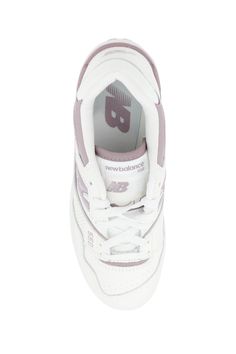 New Balance 550 smooth leather sneakers with contrasting inserts, side perforations, signature "N" inlay on the sides, "NB" logo print on the back and "550" print on the side. Padded nylon tongue with fabric logo tag, technical fabric heel tab, fabric lining with removable insole, rubber sole with side embossed logo and contrasting bottom. Composition: 100% TR, 100% leather Low-top Sneakers With Logo-print Tongue For Light Sports, White Sneakers For Jogging With Logo-print Tongue, White Sneakers With Logo-print Tongue For Jogging, High-top Sneakers With Logo-print Tongue For Light Sports, Functional Sports Sneakers With Logo-print Tongue, Functional Sports Sneakers With Logo, Classic Streetwear Sneakers With Logo-print Tongue, Sporty New Balance Sneakers With Logo Patch, Classic High-top Sneakers With Logo-print Tongue For Streetwear