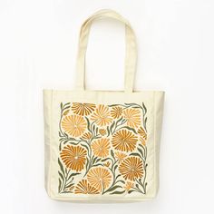 Allium Yellow Embroidered Canvas Tote Bag | Paper Source Daily Use Cotton Canvas Bag With Floral Embroidery, Cotton Tote Shoulder Bag With Floral Embroidery, Floral Embroidery Cotton Canvas Tote Bag, Yellow Cotton Gift Bag, Yellow Cotton Canvas Gift Bag, Floral Embroidered Cotton Canvas Tote Bag, Yellow Embroidered Tote Bag, Yellow Cotton Canvas Shopping Bag, Yellow Cotton Tote Canvas Bag