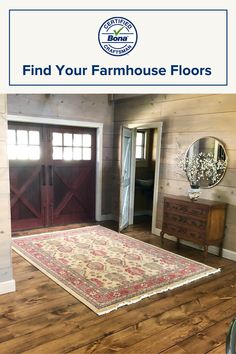 a large rug is in the middle of a room with wooden floors and doors that read find your farmhouse floors