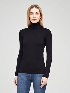 A timeless black turtleneck with full length sleeves gets a subtle sheen and smooth finish from a luxe microfiber fabrication. The slim fit compliments denim and is ideal for layering. | L'AGENCE Lani Long Sleeve Top In Black Black Turtleneck, Long Sleeve Turtleneck, Black Handle, Sleeve Styles, Length Sleeve, Full Length, Long Sleeve Tops, Top Blouse, Turtle Neck