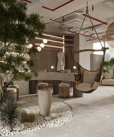 a living room with a hammock chair and potted plant in the corner