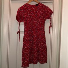 Very Cute, Light Weight Red Dress! Has A Hidden Zipper, Cute Ties On The Sleeves, And Slightly Flares Out At The Bottom. Never Worn! Bought This From Asos, So The Size 6 Fits Like A Small. I Usually Wear A 2-4 And It Fits Perfectly! Red Floral Print Mini Dress For Casual Occasions, Red Fitted Mini Dress For Daywear, Red Short Sleeve Midi Dress For Daywear, Fitted Red Mini Dress For Daywear, Casual Red Dresses For Dress Down Occasions, Red Mini Dress For Spring Daywear, Casual Red Midi Dress For Dress Down Days, Casual Red Midi Dress For Dress Down Occasion, Red Mini Dress For Daywear