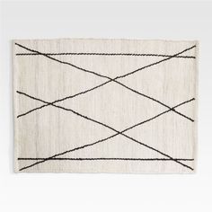 a white rug with black lines on it