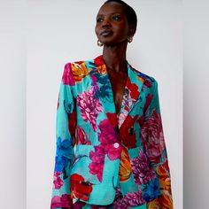 Florals Never Looked So Chic! This Organza Blazer Is So Sophisticated, Ladylike And Absolutely Gorgeous. It’s The Perfect Compliment To Jeans, Dress Or Skirt. The Colors Are Magnificent And The Sheer Fabric Is So Lightweight. Us Size: 12 Sleeve Length: 25” P2p: 18” Shoulder To Hemline: 27” Features: Organza Fabric Large, Bold Floral Print Long Sleeves Padded Shoulders Single Button Closure Front Functional Pockets Tailored Fit Summer Floral Print Blazer For Work, Silk Long Sleeve Blazer With Floral Print, Summer Blue Floral Print Outerwear, Blue Floral Print Summer Outerwear, Multicolor Printed Blazer For Spring, Blue Floral Print Spring Blazer, Spring Blue Floral Print Blazer, Pink Long Sleeve Blazer With Floral Print, Spring Pink Blazer For Brunch