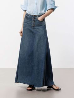 MO&Co. Women's A-line Maxi Denim Skirt This denim skirt features an A-line maxi silhouette, a flattering and versatile style that falls gently away from the body. Crafted from premium cotton, this skirt features a pleated and raw hem design that adds a unique and trendy touch, while the deep blue hue gives it a classic and timeless look. Pair with a cute top or tucked-in blouse for a chic outfit. Features : - Mid waist A-line maxi silhouette- Classic five pocket design- Pleated and raw hem desig Maxi Denim Skirt, Denim Maxi Skirt, Chic Outfit, Mesh Bag, Versatile Style, The Deep, Blue Hues, Pocket Design, Cute Tops