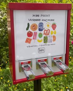 a vending machine with four different kinds of donuts on it's sides