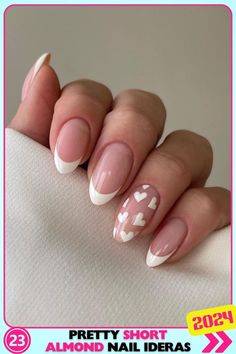 Short almond nails with white heart French tips. Made with glossy gel, these nails are ideal for romantic occasions or showing self-love. The tiny hearts add a cute, playful twist. Possible search terms: heart nails, romantic nails, French tips. Cute Simple Nails, Simple Gel Nails, Cute Nail Ideas, Summery Nails, Casual Nails, Short Acrylic Nails Designs, Heart Nails, Cute Nail Designs, Valentine's Day Nails