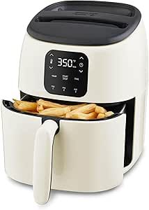 an air fryer with french fries in it on a white surface and black trim