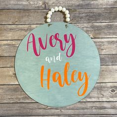 a wooden sign that says, avery and haley