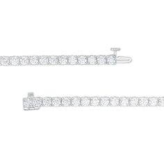 Dazzle and delight the one you adore with the stunning 9 cts. t.w. of diamonds in this classic tennis bracelet. Fashioned in 14K white gold This tennis-style look sparkles with 1/4 ct. diamonds. Smaller 1/5 ct. diamonds shimmer near the clasp to complete the continuous design. This 7.25-inch bracelet secures with a box clasp. Classic White Diamond Bracelet With Accents, White Diamond Bracelet With Brilliant Cut, Timeless White Diamond Bracelet With Brilliant Cut, White Brilliant Cut Diamond Bracelet, Classic Tennis Bracelet In Diamond White With Diamond Cut, Classic Platinum Tennis Necklace With Prong Setting, Classic White Diamond Bracelet For Formal Occasions, Classic White Bracelet With Brilliant Cut, Classic Diamond White Tennis Bracelet For Anniversary