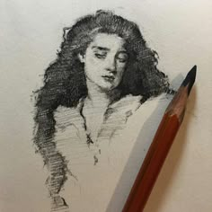 a pencil drawing of a woman with long hair